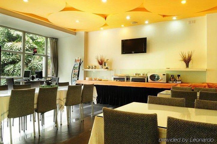 Guangzhou Colorful Days Hotel Restaurante foto
